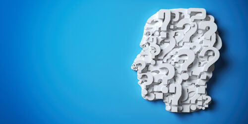 A human head silhouette made up of overlapping white question marks against a bright blue background, symbolizing curiosity, confusion, or uncertainty after a brain injury during surgery.